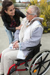 Young woman comforting her grandmother