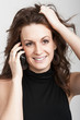 Photo: Frau telefoniert Frau telefoniert
