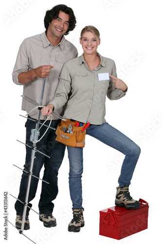 Photo: Repairers with antenna on white background Repairers with antenna on white background