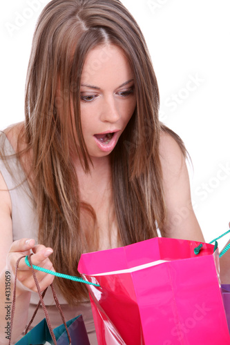 Foto: Young woman with shopping bags Young woman with shopping bags