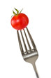 Photo: Fork with a little red tomato Fork with a little red tomato