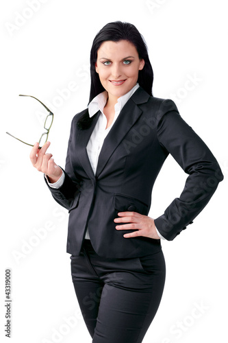 Foto: Confident business woman with a pair of glasses Confident business woman with a pair of glasses
