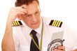 Foto: Airline pilot using flight computer Airline pilot using flight computer