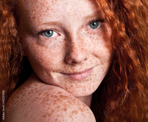 Photo: Cheerful freckled girl Cheerful freckled girl