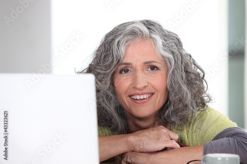 Photo: Woman surfing the internet Woman surfing the internet