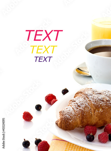 Photo: croissant, a cup of coffee, orange juice and fruit for breakfast croissant, a cup of coffee, orange juice and fruit for breakfast