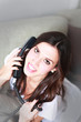 Frau am Telefon