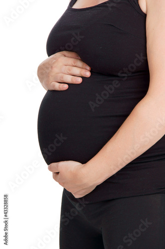 Foto: pregnant woman holding her belly pregnant woman holding her belly