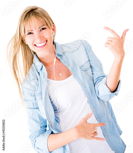 Photo: Woman listening to music Woman listening to music