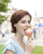Photo: young woman with ice cream in the city young woman with ice cream in the city