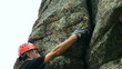 Man climbing a rock face