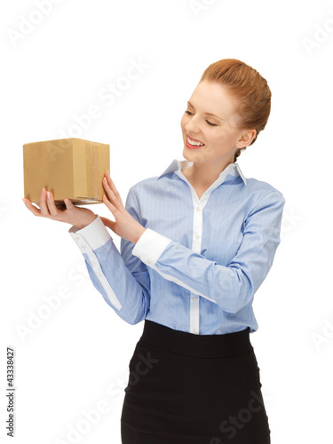 Photo: woman with cardboard box woman with cardboard box