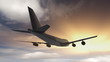 A Boeing 747 Jumbo jet flies towards a sunset.