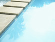 Walkway next to swimming pool