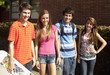 Teenage friends standing together