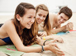 Teenagers hanging out together on beach