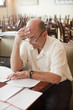 Caucasian restaurant owner working in booth