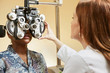 Optician adjusting equipment for patient
