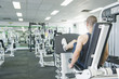 Middle Eastern man exercising in health club