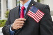 Chinese businessman holding American flag