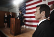 Security guard with earpiece at public speech