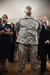 Soldier among supporters at political gathering