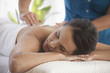Hispanic woman having massage