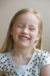Grinning girl with eyes closed