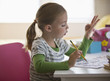Caucasian girl doing math homework