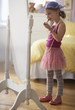 Caucasian girl dressing up