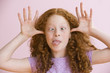 Mixed race girl making silly face