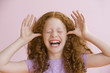 Mixed race girl making silly face
