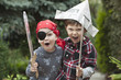 Caucasian boys playing pirates