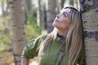 Hispanic woman hiking in forest