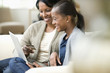 Mother and daughter shopping online with credit card