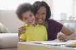 Mother and son drawing together