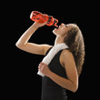 Caucasian woman drinking from water bottle