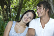 Photo: a Beautiful young couple having fun outdoors a Beautiful young couple having fun outdoors