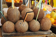 Coconuts on tray decorating a picnic table