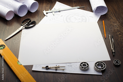 Photo: Tools and papers with sketches Tools and papers with sketches