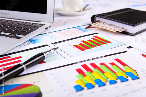 Photo: Financial papers on the table Financial papers on the table