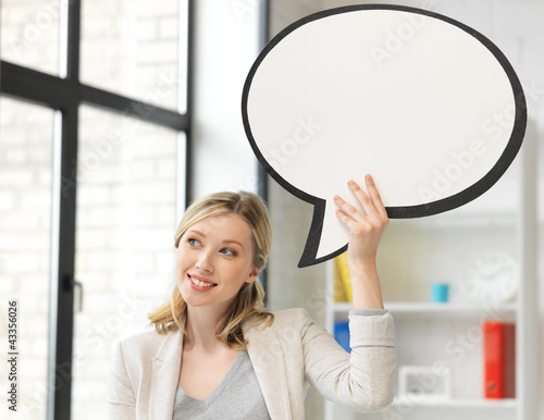 Photo: smiling businesswoman with blank text bubble smiling businesswoman with blank text bubble