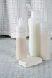 Soap and bottles shampoo, conditioner and shower gel