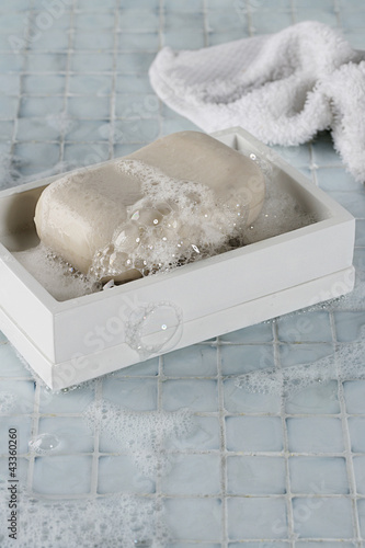 Photo: Soapy bar of soap in box Soapy bar of soap in box