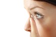 woman with contact lense (white background)