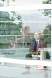 Hispanic businessman looking out window