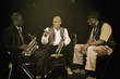 Musicians playing in jazz band on stage