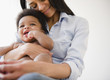 African American mother holding baby boy