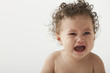 Crying mixed race baby girl