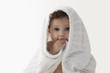 Mixed race baby girl wrapped in a blanket